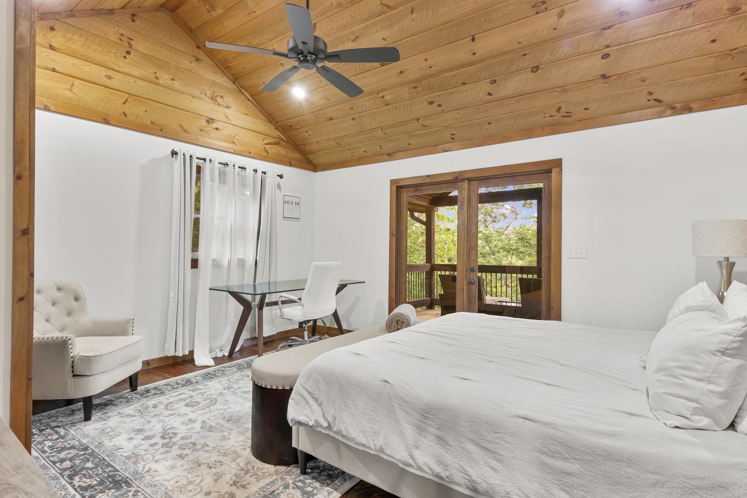 Vaulted bedroom with private porch